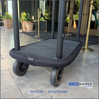 DuraBumper Item #PTBG installed on luggage cart making a professional appearance in front of hotel entrance.